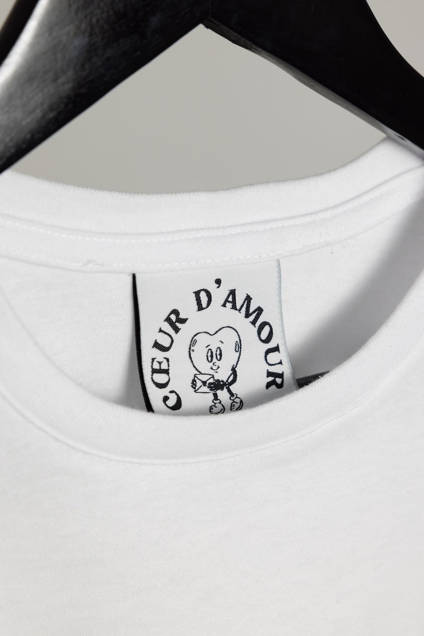 Close-up des Necklabels mit Coeur d'Amour Logo